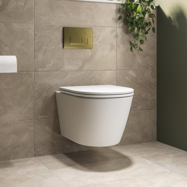 Matt White Wall Hung Rimless Toilet with Soft Close Seat, Brushed Brass Pneumatic Flush Plate, 820mm Frame & Cistern - Newport